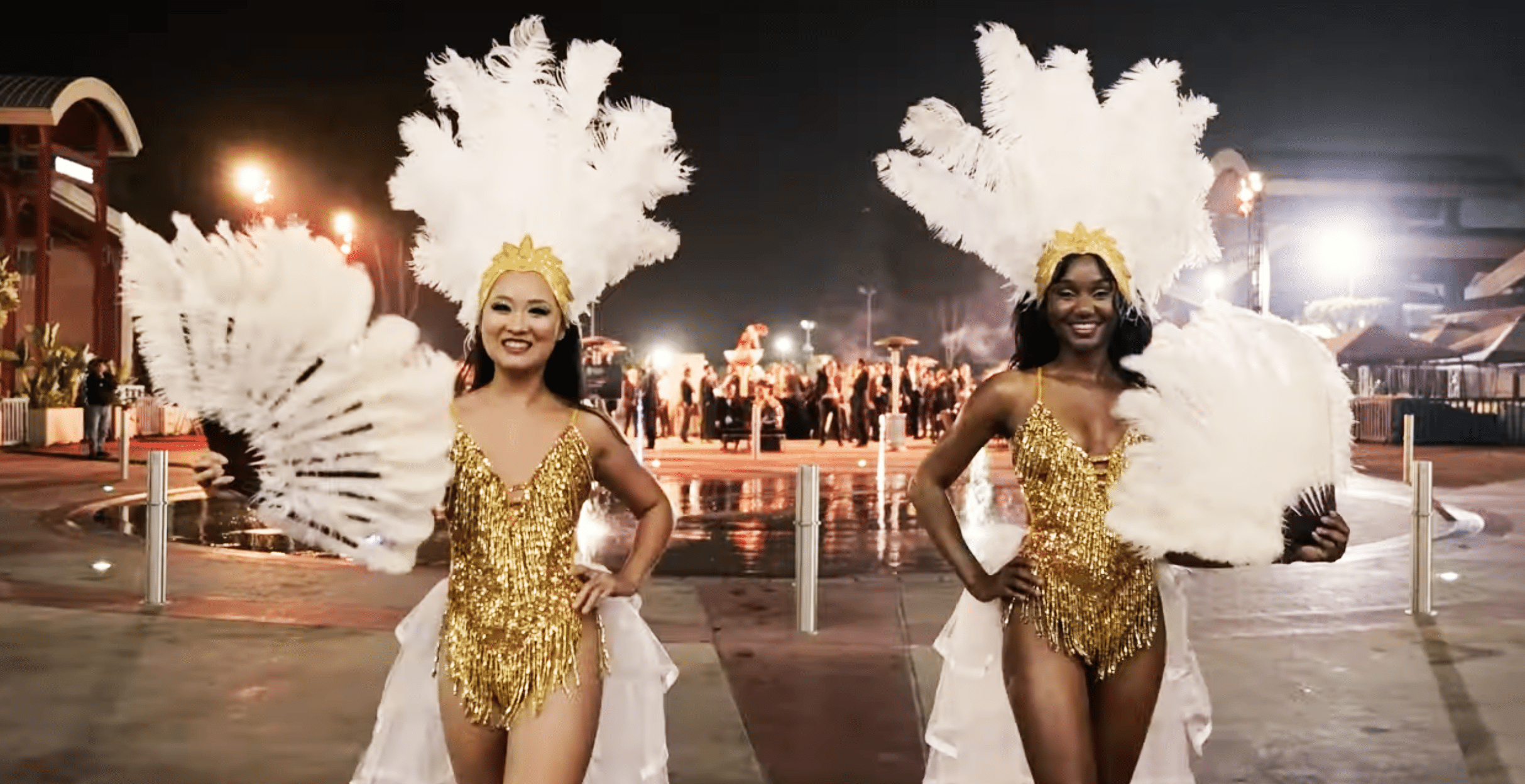 Showgirls smile at an event featuring corporate event entertainment in Los Angeles, CA